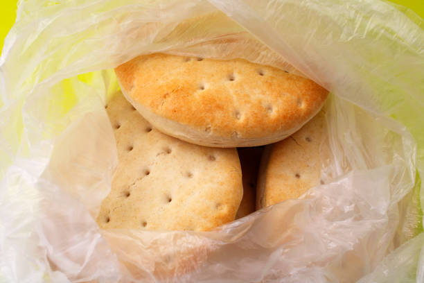 istock Plastic bag with Hallullas, typical breads of Chile 2175317598