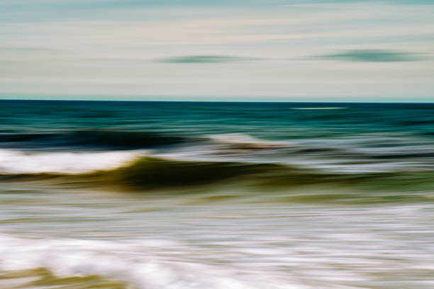 istock Abstract image of waves in motion with a smooth, serene seascape. 2175319763