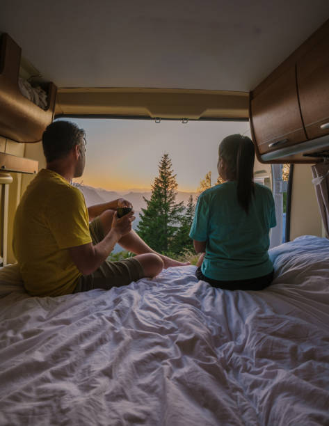 istock Enjoying a serene sunrise view from a cozy camper in Hallstatt, Austria 2175320062