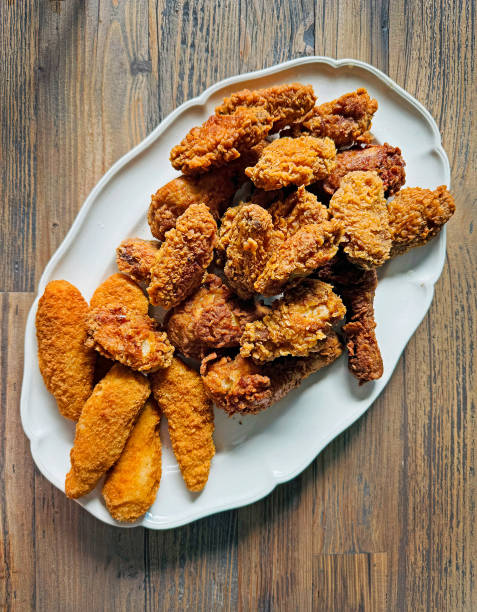 istock fried chicken wings and fillet pieces 2175326875