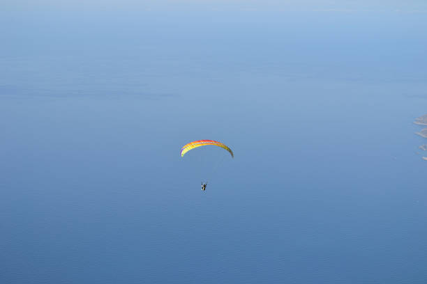 istock Paragliding flight from Mount Babadag to Oludeniz. 2175330274