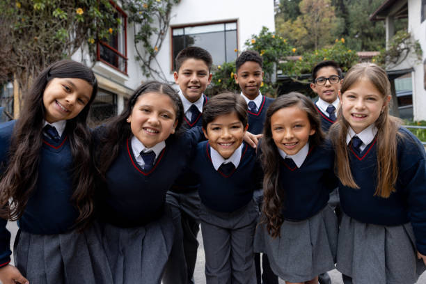 istock Happy group of kids smiling at the school 2175339344