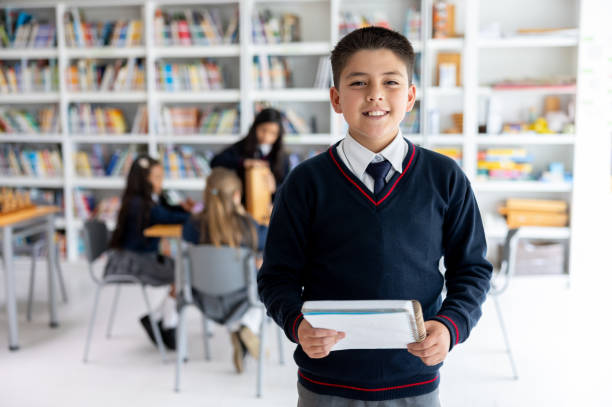 istock Happy boy smiling in the classroom at the school 2175339391