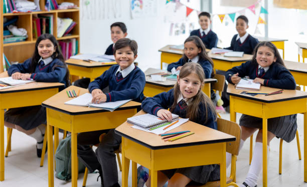 istock Happy group of elementary students at the school 2175339405