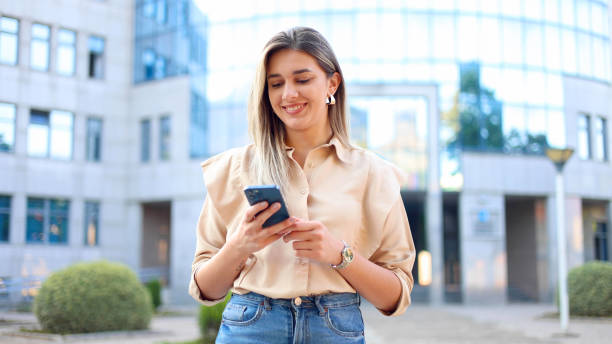 istock Happy woman coming back from work and surfing the net 2175340482