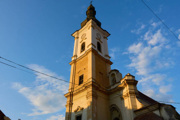 Grajski Trg square with a baroque statue of St. Florian in the old town by twilight