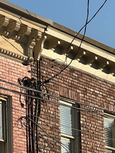 istock Messy power lines on a city street. 2175363202