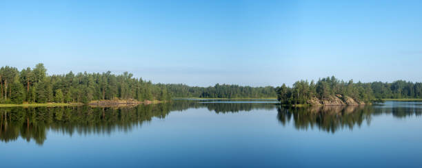 istock panorama of forest lake with reflections 2175363307