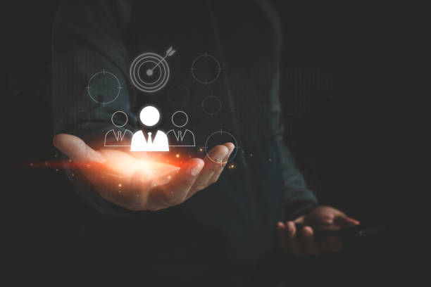 istock Know your customer (KYC) concept. Finding the target audience of a business, thinking about digital marketing online to find customers, customer service, and social media. Target customer on hand. 2175368706