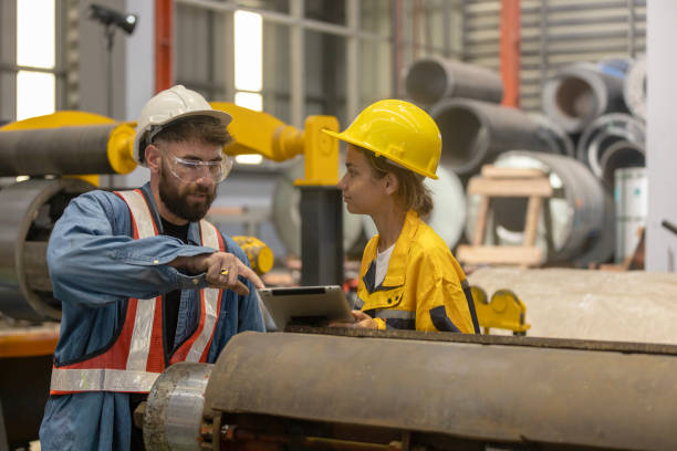 istock Metal Factory, Supervisor, and Trainee 2175379951