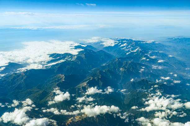 aerial view of mountain range in fog