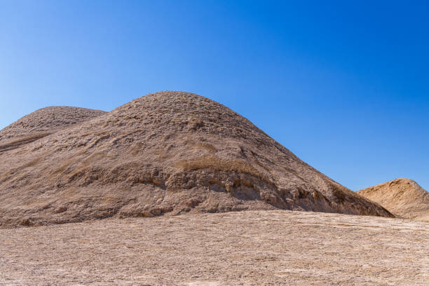 Field of rounded yardangs-usually eroded elongated streamlined landforms wind carved in tectonically folded sedimentary rock. Beside 305 Prov.Road crossing Qaidam basin desert-Qinghai province-China.