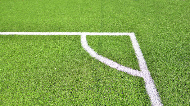 istock Artificial football turf with a white dividing line. 2175388655