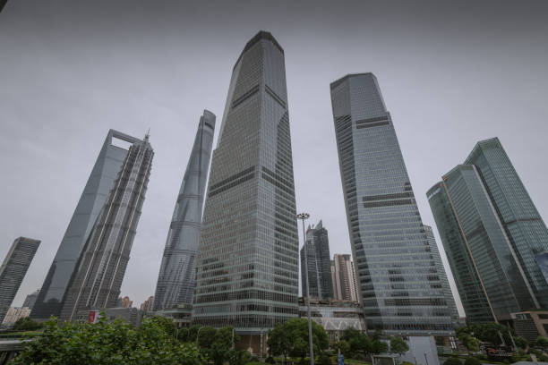 Shanghai, China - December 30, 2022: Strolling through Pudong district in Shanghai near skyscrapers.