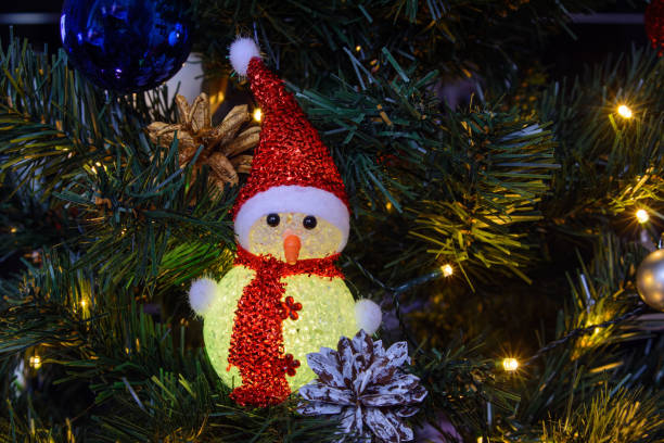 istock Colored Christmas decorations sparkle merrily on the Christmas tree, creating an atmosphere of magic and festive coziness 2175391063