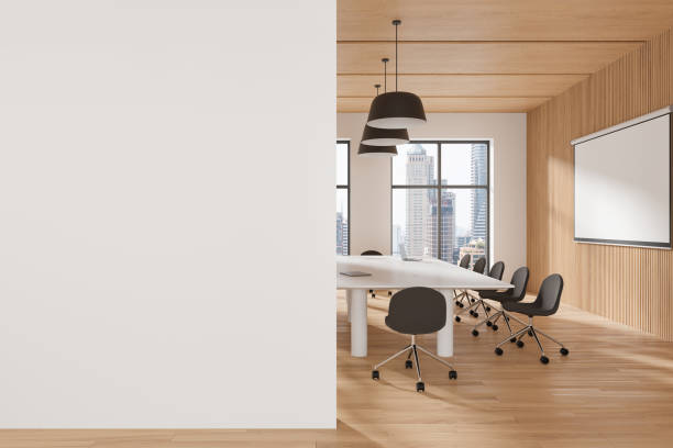 istock Conference room interior with blank projection screen, window. Mockup wall 2175391647