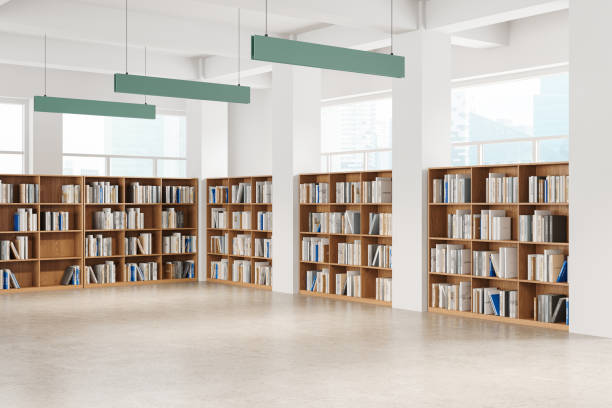 istock Stylish library interior with wooden bookcase in row, panoramic window 2175391795