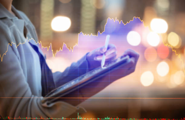 istock Manage online business offshore trade with mobile app using ticker bid - offer before fundamental analysis and financial graph in stockmarket forex cryptocurrency global invest abstract background 2175392531