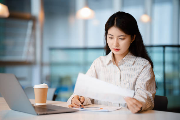 istock Young beautiful woman working in the office 2175395722