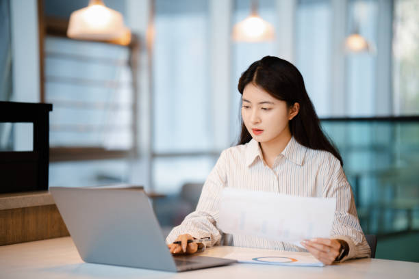 istock Young beautiful woman working in the office 2175395758