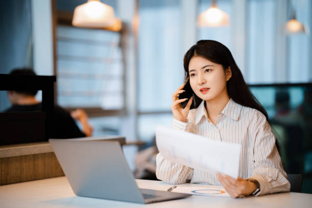 istock Young beautiful woman working in the office 2175395830
