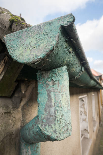 istock Water drainage from the roof, old gutter, patina. 2175396102