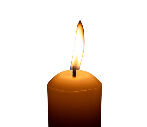 istock A single burning candle flame or light glowing on a big white candle isolated on white background with clipping path. 2175396619