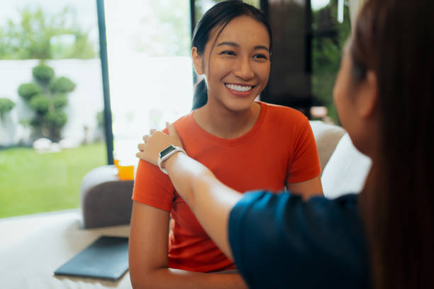 Smiling woman sharing a friendly moment indoors