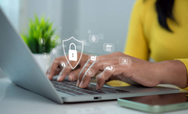 istock Cybersecurity and Global network security technology concept, Businesswoman protecting personal data on computer with virtual interface, Internet secure technology, Cyber security. 2175403383