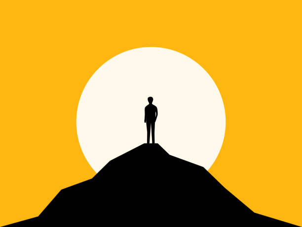 istock Confident businessman standing on top of a high mountain 2175404314
