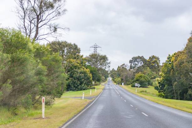 istock Long Open Highway Stretching Across Peaceful Countryside 2175406427
