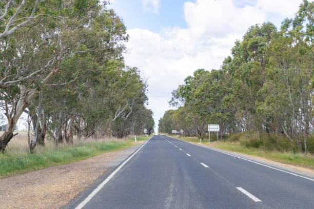 istock Long Open Highway Stretching Across Peaceful Countryside 2175406571