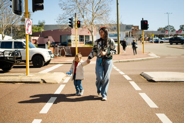 istock Mother And Son Crossing Street 2175407584