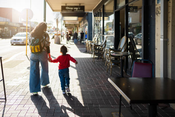 istock An Asian mother takes her son for a walk 2175407826