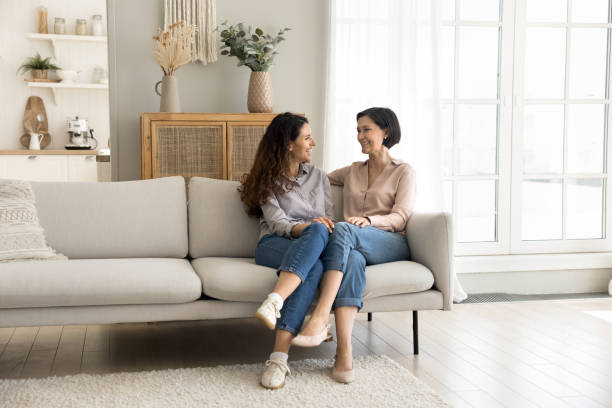 istock Loving mother enjoy pleasant conversation with grown up daughter 2175408102
