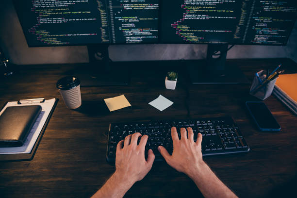 istock Photo of freelancer hands arms typing software code modern gadget work indoors workplace workstation loft 2175408103