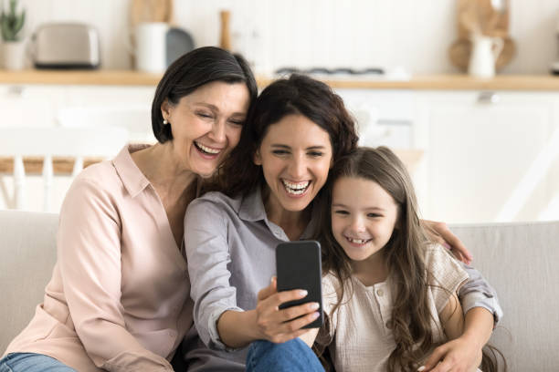 istock Diverse generation of women using modern smartphone 2175409645