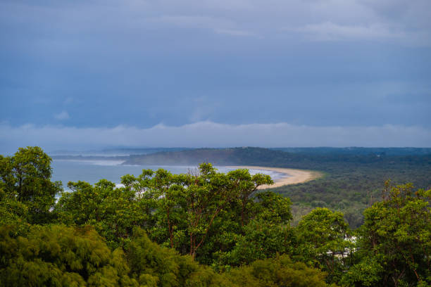 Aerial view overlooking One Mile Beach at the city of Forster, Australia. Seen dramatic cloudy day.