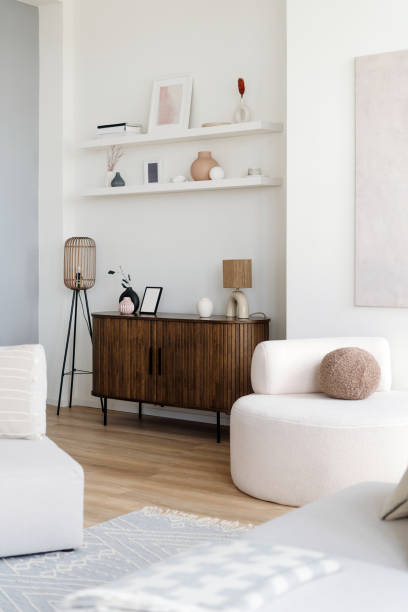 istock Modern interior featuring a wooden sideboard and minimalist decor in a cozy living room 2175431583
