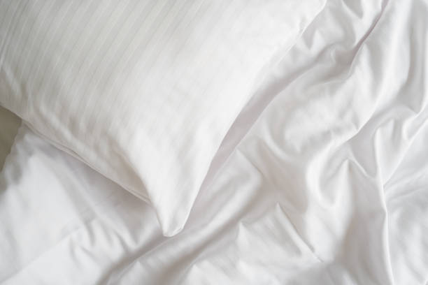 istock White pillowcase on memory foam pillow and clean and fresh bedsheets 2175433388