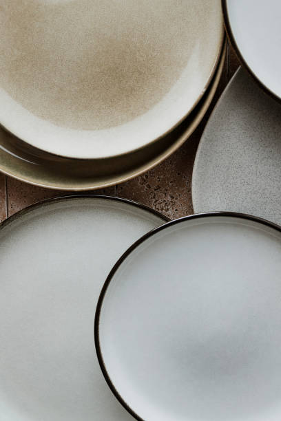 istock Top view of modern various ceramic plates on a kitchen table, cooking concept. 2175433659