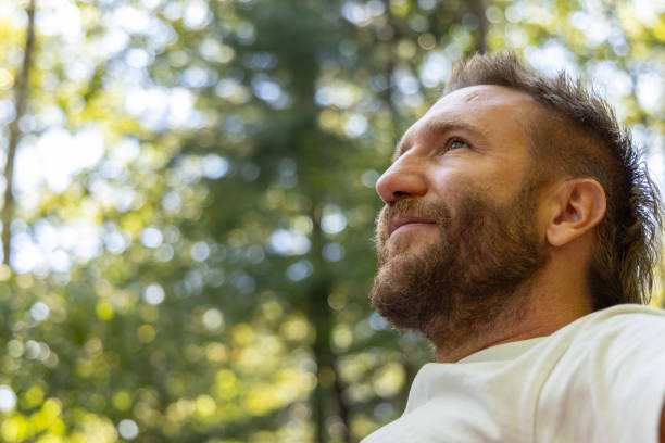 istock Thoughtful Man Relaxing in Nature 2175438572