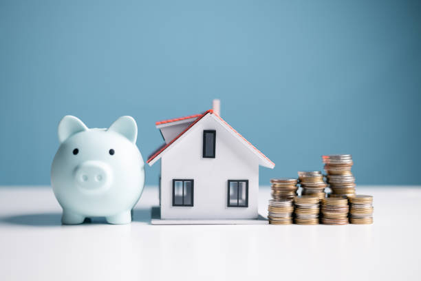 istock Concept of saving money for loan can help reduce debt when buy house or home, while understanding bank equity is essential for any business investment. loan, money, house, home, bank, debt, concept. 2175439607