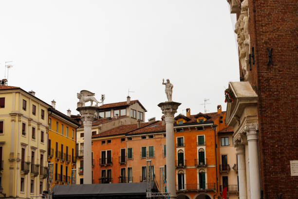 View of the Piazza dei Signori, the column Leone on the left and the column of the Redentore on the right, Vicenza. Italy