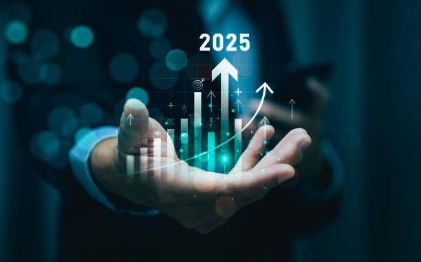 istock Hand Holding 2025 Financial Growth Projection with Digital Bar Graphs and Arrows Symbolizing Business Success, Strategic Planning, and Economic Forecast for Future Profitability and Market Expansion 2175445710