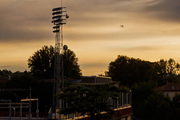 Sports stadium lights at dusk, Vicenza