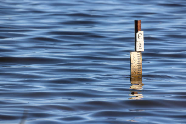 Floodwater depth indicator sign, or board. Indicate water level during flooding in Outback, rural Australia. Copy space.
