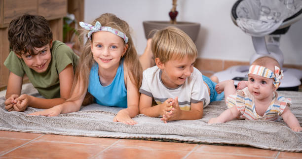 istock Kids Laying on the Floor 2175456238