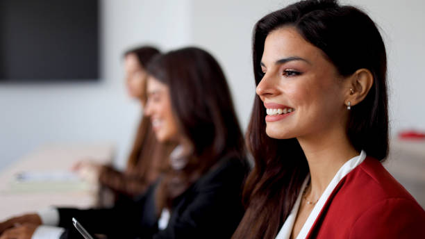 istock Female business team attending a business conference 2175457802