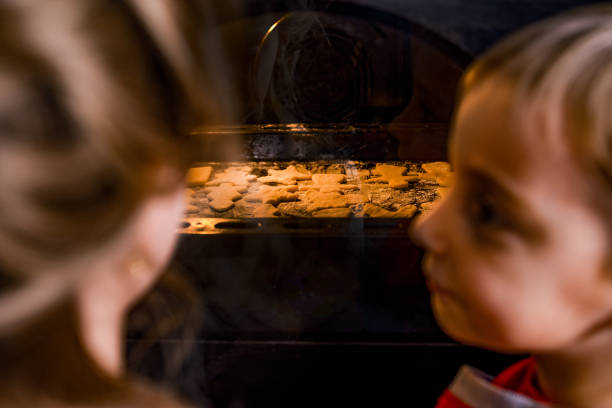 A mother and daughter bond over baking, creating joyful memories in a cheerful, bright kitchen.